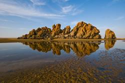 Oman Scuba Diving Holiday. Sifah Rock Island Reflection.